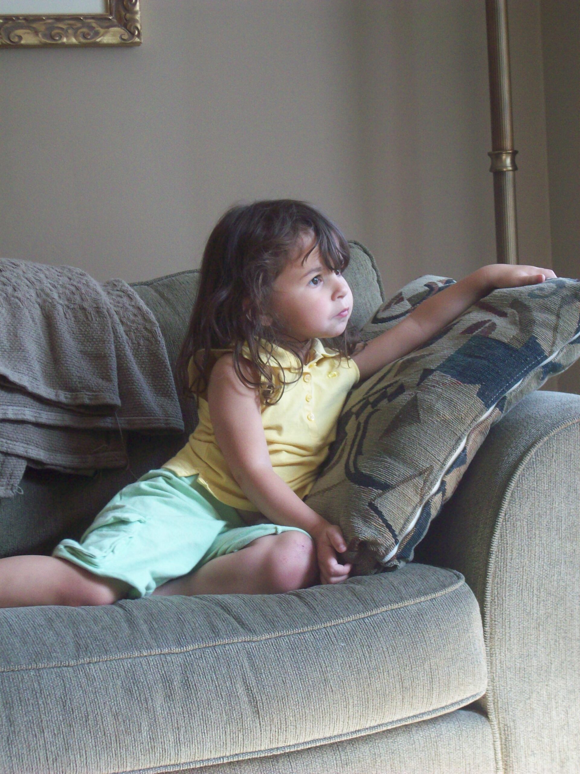 Before I discovered doing, there was being. Just like this young child who is looking out the window. toddler relaxed looking out the window