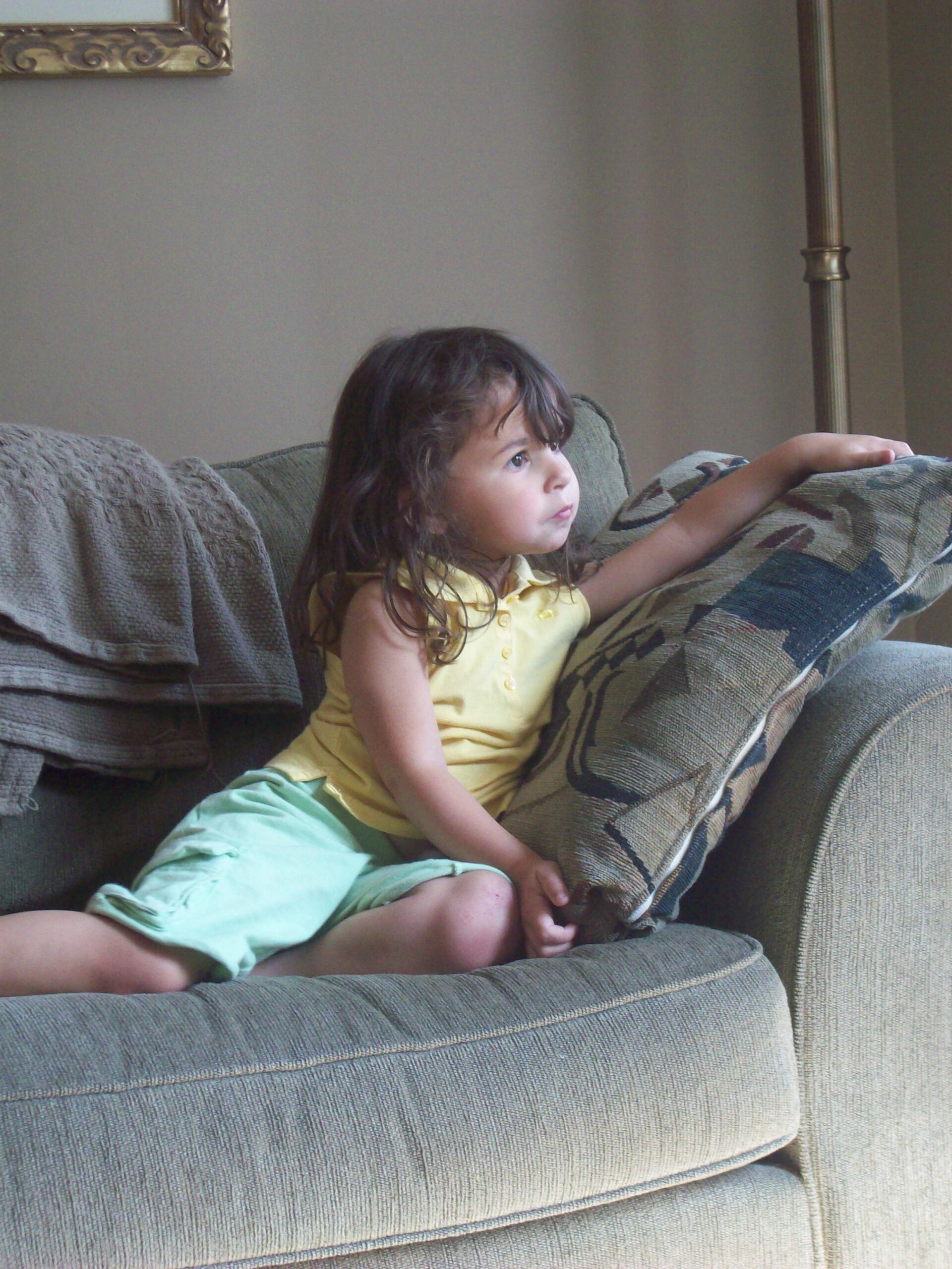 toddler relaxed looking out the window